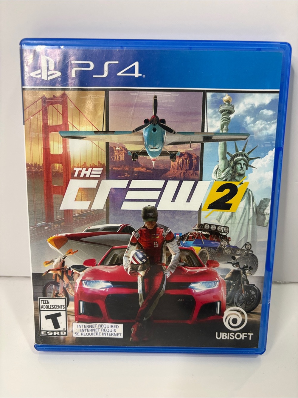 Sony PS4 The Crew 2  - water damage to Case art, Disc is in Good condition